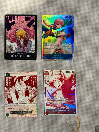 One Piece Card Game 13-card set featuring Monkey D. Luffy SEC and SR cards in protective sleeves