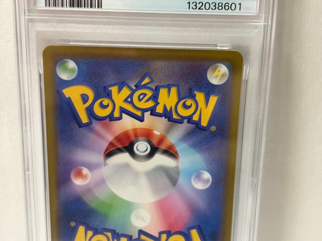Pokemon Card featuring Pikachu from Dark Nemesis set graded PSA10 with visible flaws and included case