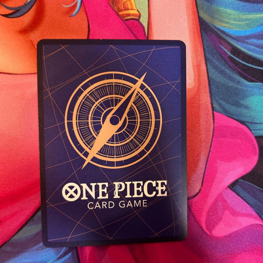 One Piece Card Game Nami OP11-054 Parallel card from Romance Dawn series with a small white scratch