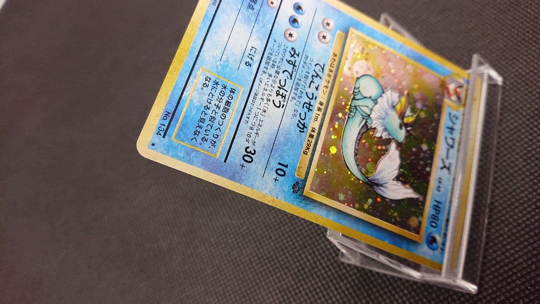 Pokemon Card Collection featuring old card back designs from Japan import displayed in a fan layout