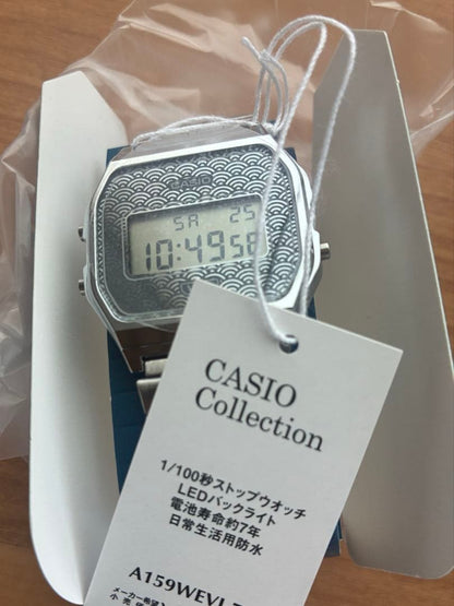 Casio Digital Watch Model A168WE-1 with Wave Pattern Dial and Stainless Steel Band — Japan Import