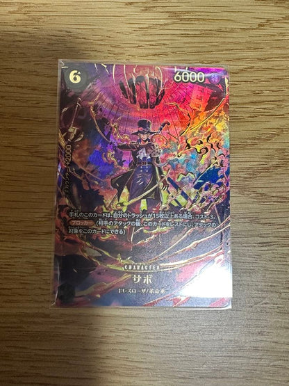 Sabo SP PRB02-014 One Piece Card Game card placed in protective sleeve