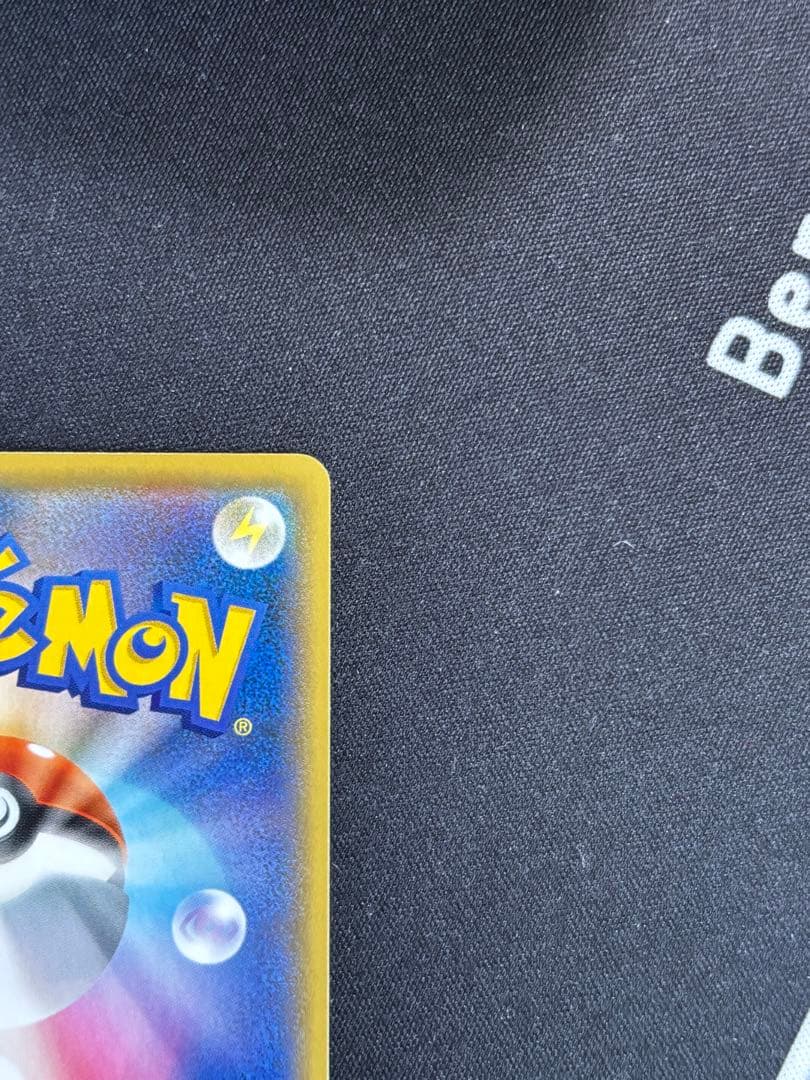 Bandai Pokemon 25th Anniversary Promo Pack featuring Magma Groudon card in protective hard case
