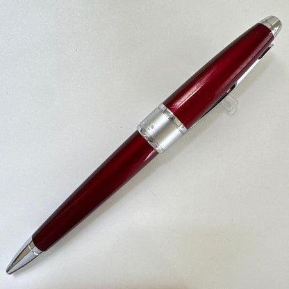 Cross Apogee red ballpoint pen with twist mechanism, Japan import, showing minor signs of use