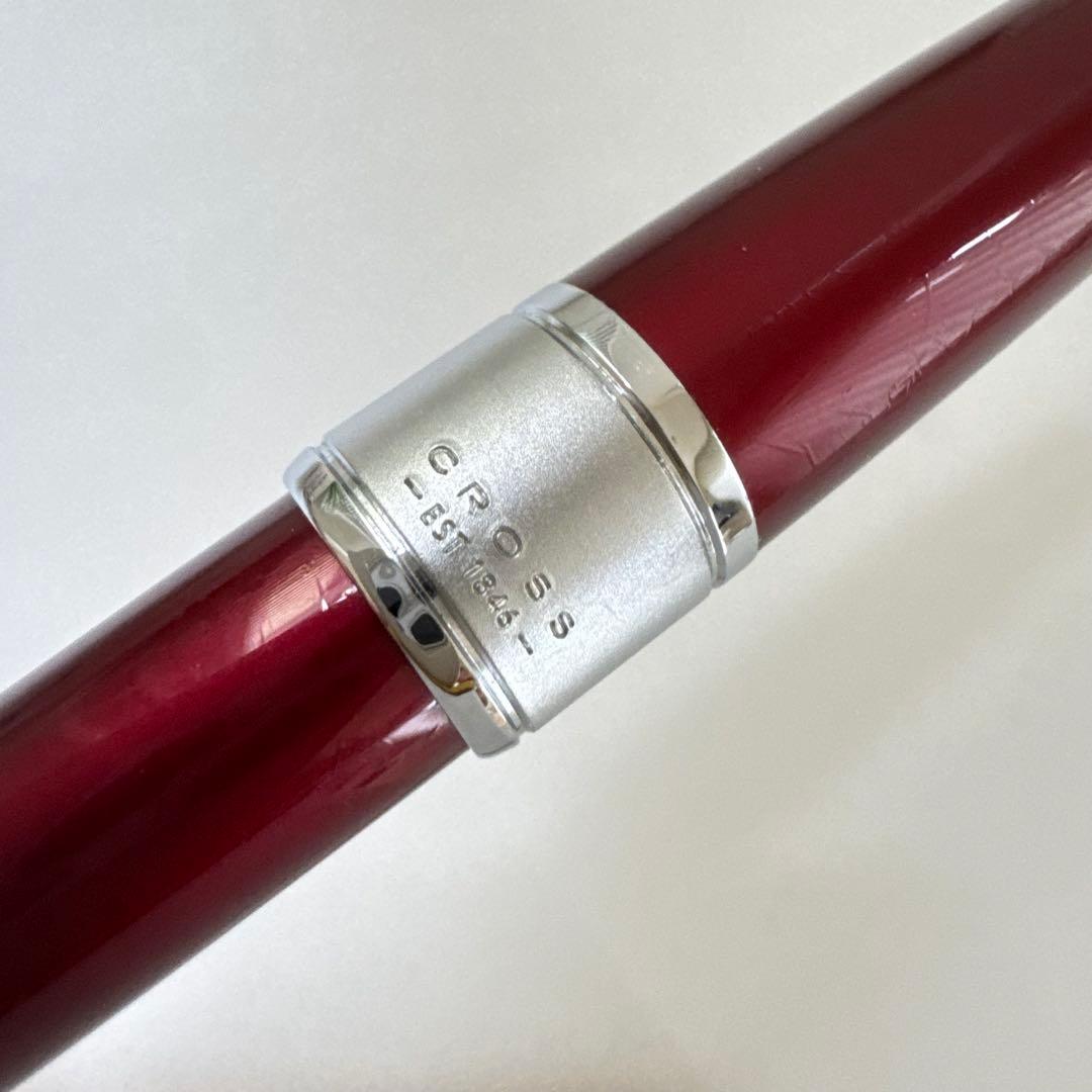 Cross Apogee red ballpoint pen with twist mechanism, Japan import, showing minor signs of use