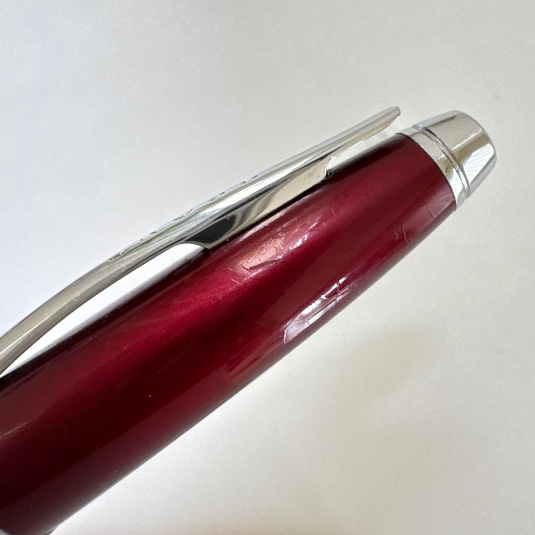 Cross Apogee red ballpoint pen with twist mechanism, Japan import, showing minor signs of use