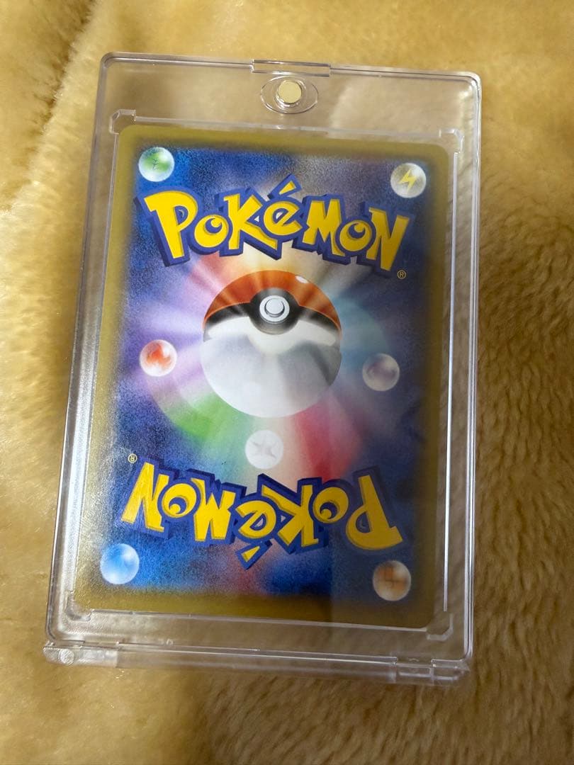 Pokemon Card Kokuba Badrex VMAX HR SA rare collectible in pristine condition inside a protective case