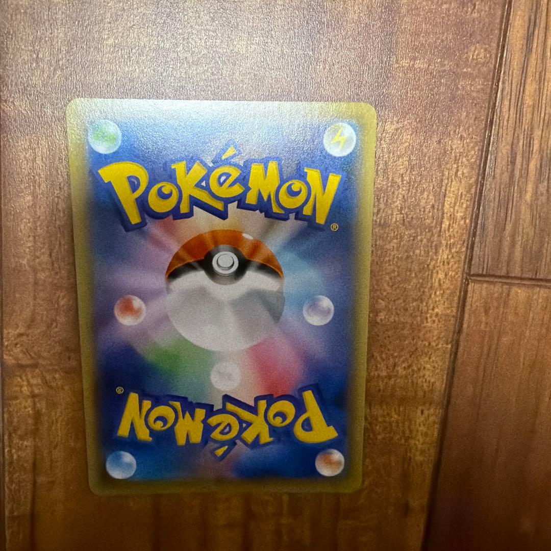 Pokemon Card Kokuba Badrex VMAX HR SA rare collectible in pristine condition inside a protective case