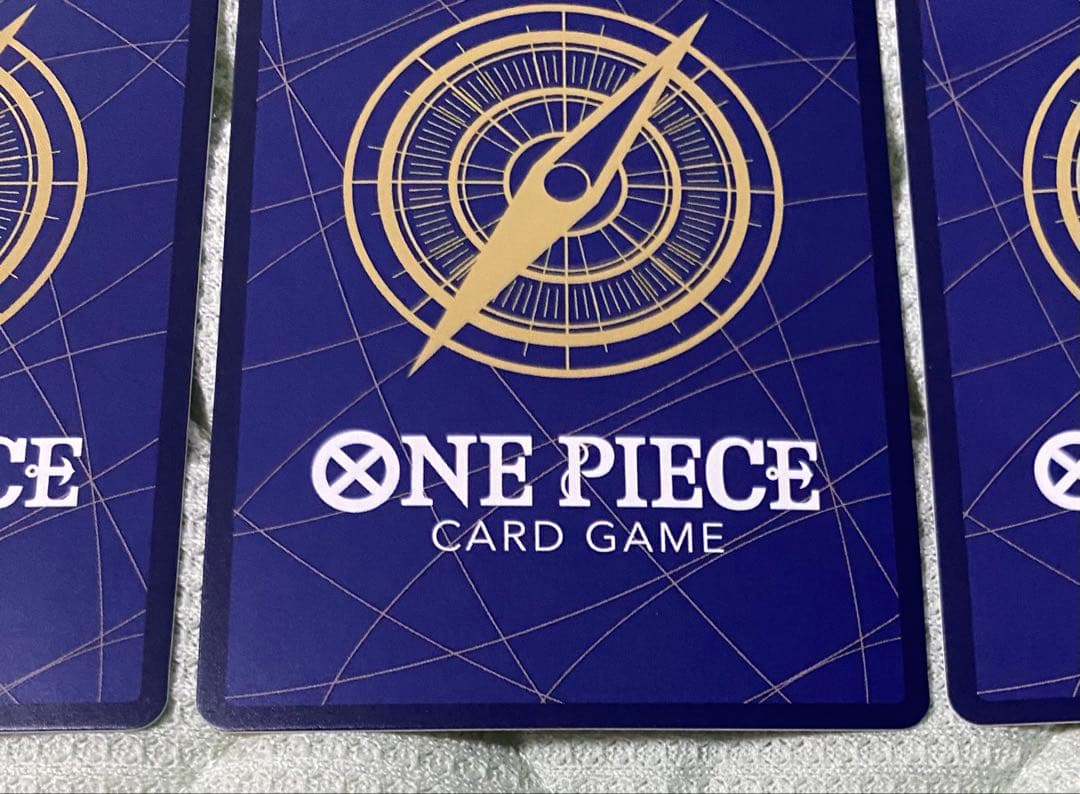 Bandai One Piece trading card set with Monkey D Luffy Zoro Trafalgar Law featuring three cards from Japan