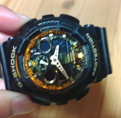 Casio G-Shock GA-100CF Watch with Battery, Magnetic Resistant, Shock Resistant, Camouflage Pattern — Japan Import