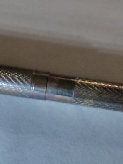 NEWMAN vintage sterling silver mechanical pencil with knock mechanism and fine wave pattern on body