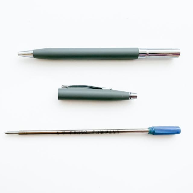 Close-up of Cross Classic Century vintage grey ballpoint pen with twist mechanism, matte finish, 1990s model