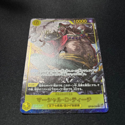 Marshall D. Teach OP16-119 Parallel Card from One Piece series stored in protective sleeve and hard case