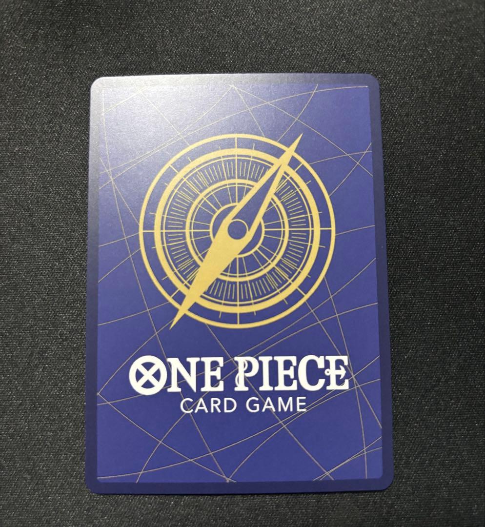 Marshall D. Teach OP16-119 Parallel Card from One Piece series stored in protective sleeve and hard case