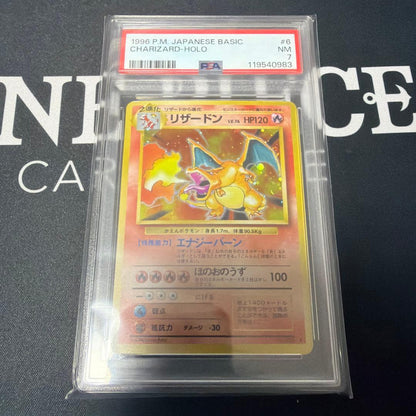 Pokemon PSA7 Charizard Flame Lizardon card from 1996 First Expansion Pack graded PSA7