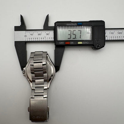Casio MTP-1228DJ Vintage Mens Wristwatch with Date and Day, Silver Stainless Steel — Japan Import