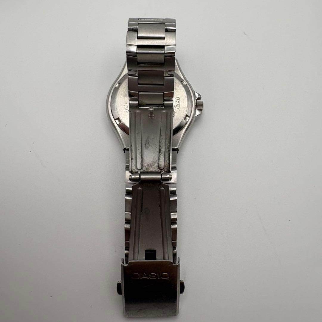 Casio MTP-1228DJ Vintage Mens Wristwatch with Date and Day, Silver Stainless Steel — Japan Import