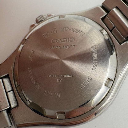 Casio MTP-1228DJ Vintage Mens Wristwatch with Date and Day, Silver Stainless Steel — Japan Import