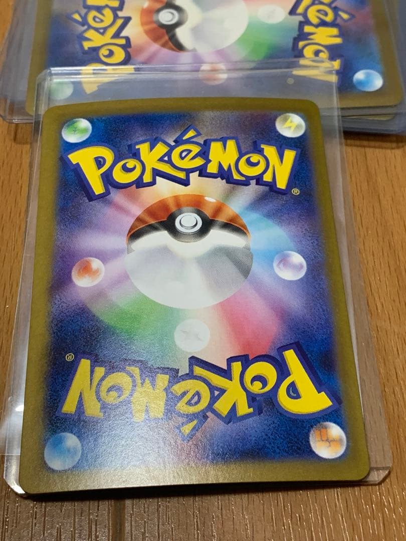 Pokemon Card Zekrom EX 174/086 BWR shown in protective packaging against damage and water