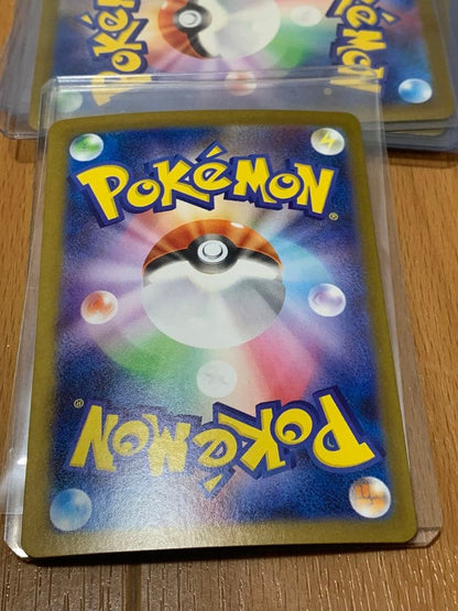 Pokemon Card Zekrom EX 174/086 BWR shown in protective packaging against damage and water