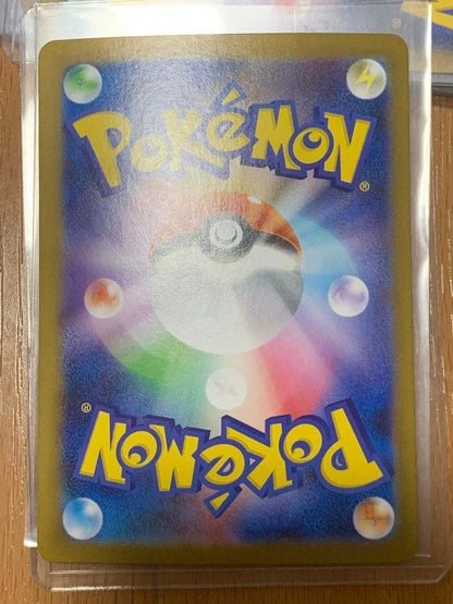 Pokemon Card Zekrom EX 174/086 BWR shown in protective packaging against damage and water