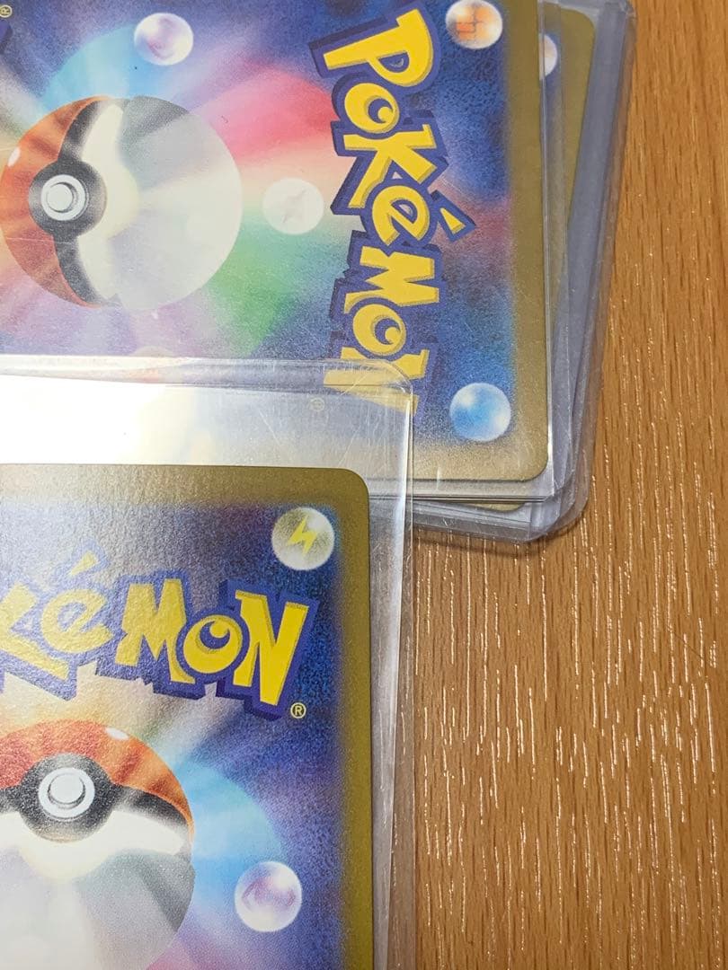 Pokemon Card Zekrom EX 174/086 BWR shown in protective packaging against damage and water