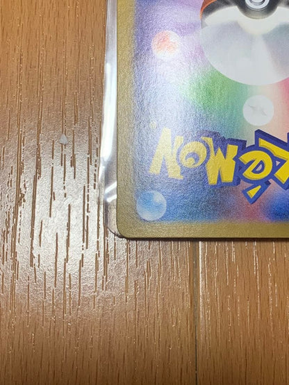 Pokemon Card Zekrom EX 174/086 BWR shown in protective packaging against damage and water