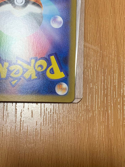 Pokemon Card Zekrom EX 174/086 BWR shown in protective packaging against damage and water