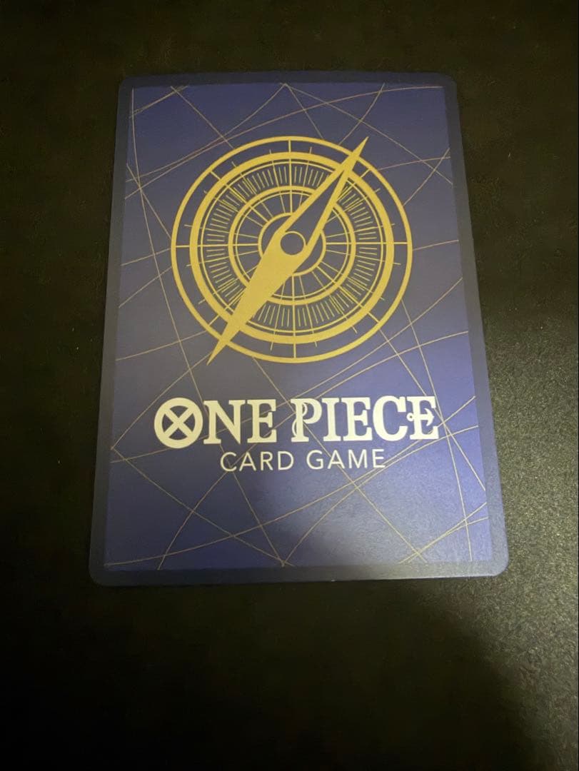 One Piece Rebecca SP card game card showing front with used play condition and white stain on the back
