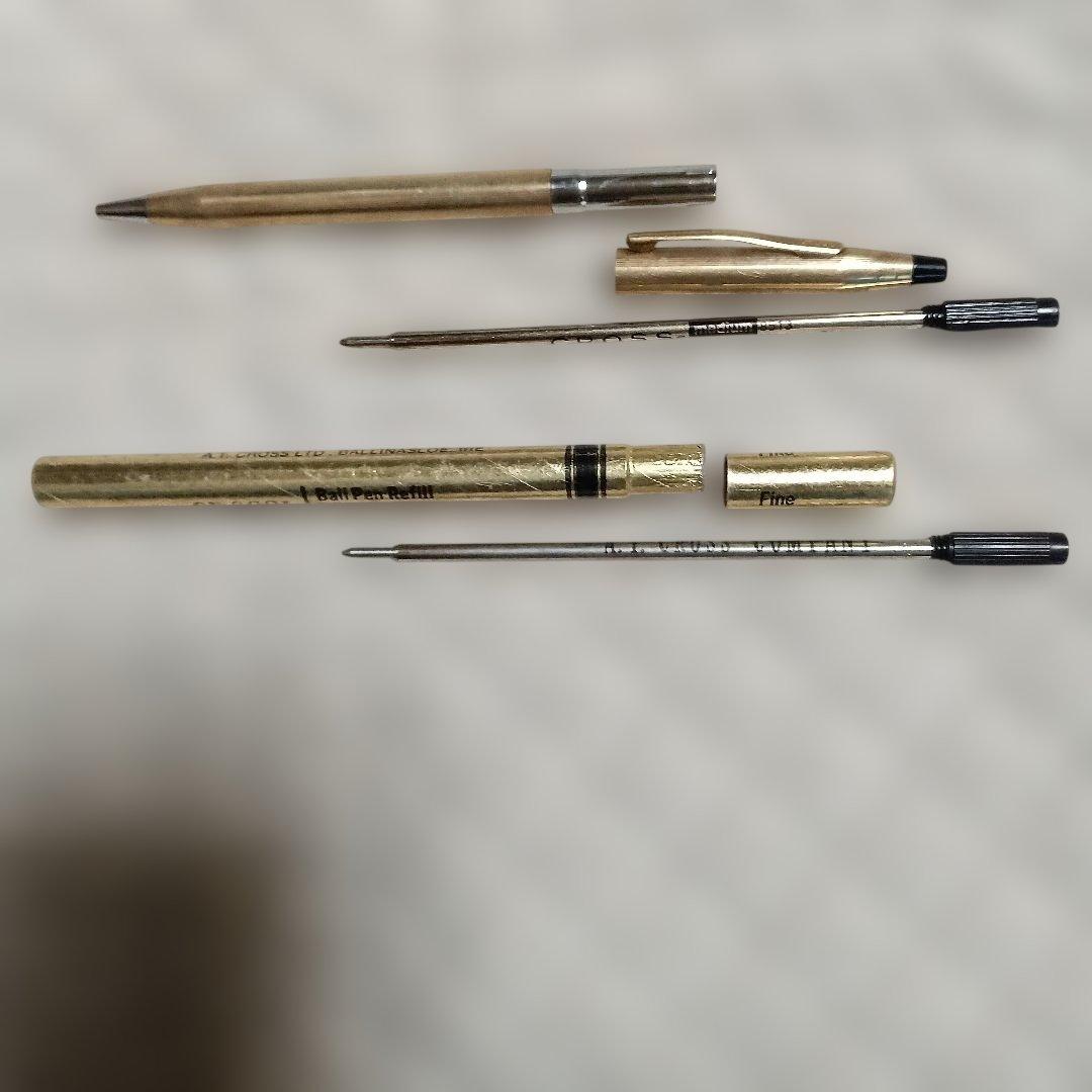 Gold-colored ballpoint pen with replacement ink cartridge, Japanese import, brand unknown