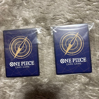 One Piece Monkey D. Luffy OP16-034R trading card with bonus OP16-015SR displayed with sleeve