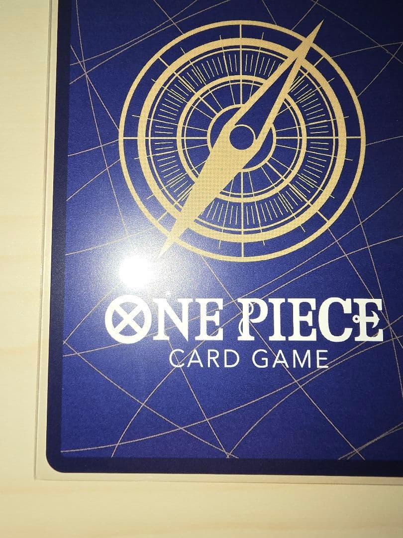 One Piece Card Battle of Wills featuring Ace Secret Parallel card in used condition stored in hard sleeve