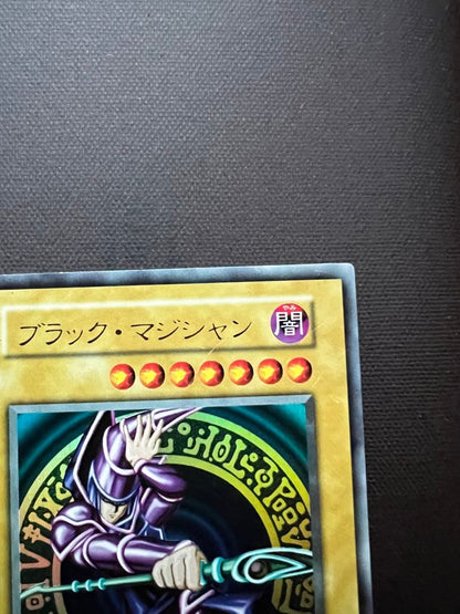 Bandai Black Magician Initial Ultra collectible figure showing front and side views