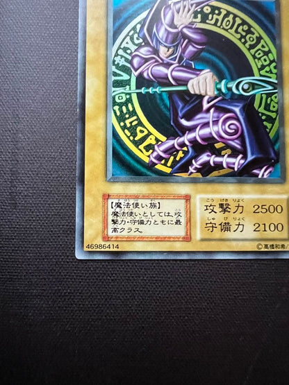Bandai Black Magician Initial Ultra collectible figure showing front and side views