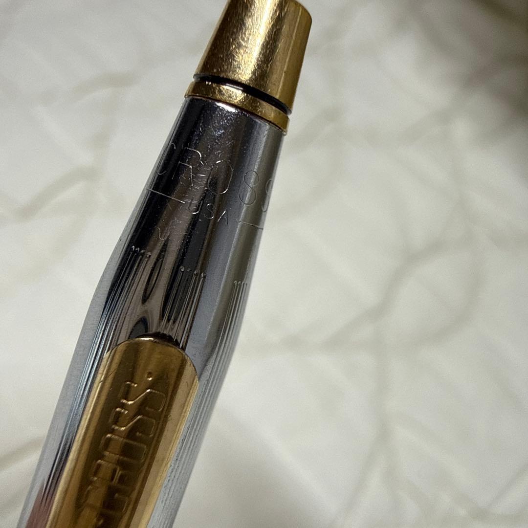 Cross brand rotate ballpoint pen with silver and gold finish shown in main photo