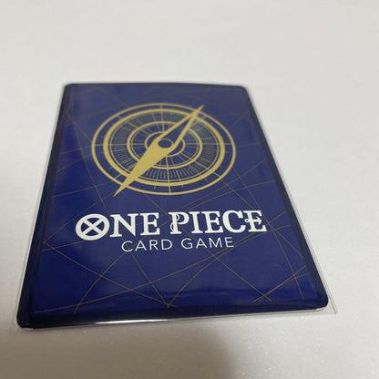 Monkey D. Luffy One Piece OP-033 card from Weekly Shonen Jump showing front with some minor red stains