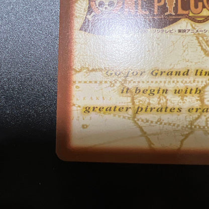 One Piece Monkey D. Luffy OP33 C33 Bagi Pirate single trading card showing front design with minor scratches