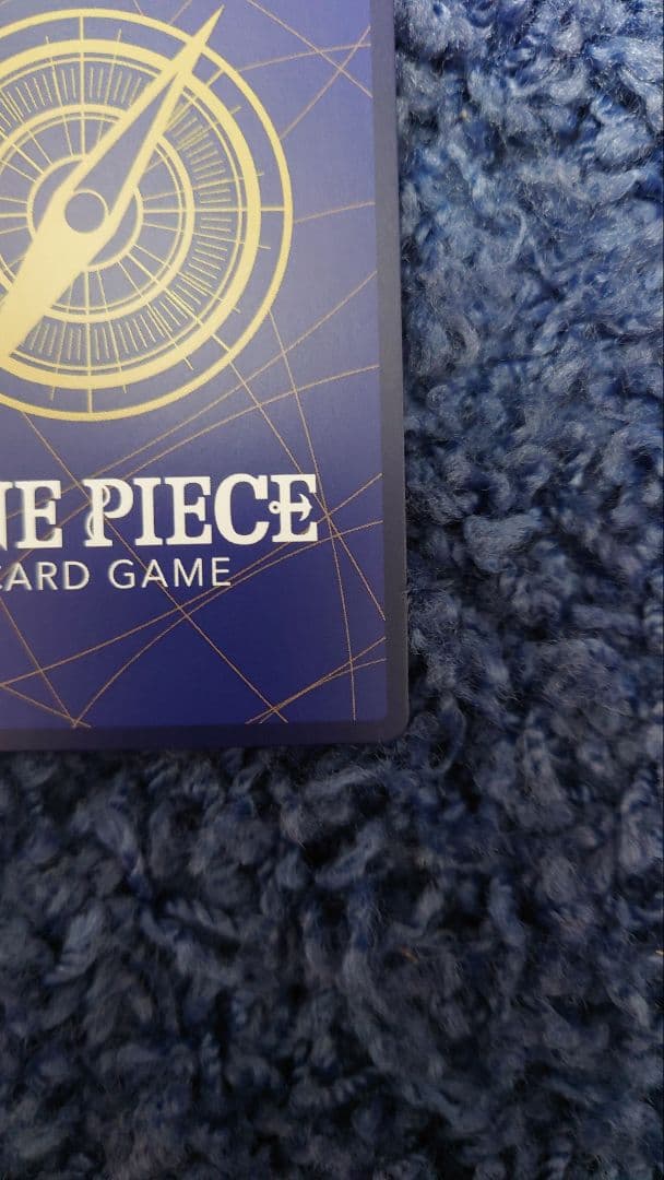 One Piece Portgas D. Ace P-028 card in sleeve with loader and zip lock in cardboard sandwich
