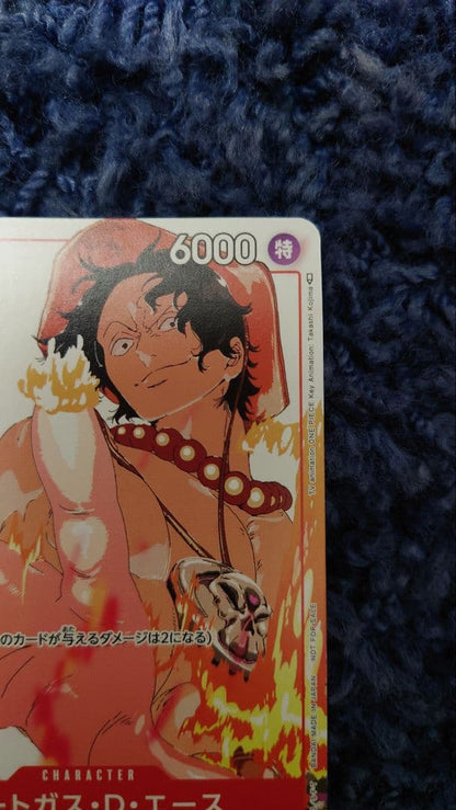 One Piece Portgas D. Ace P-028 card in sleeve with loader and zip lock in cardboard sandwich