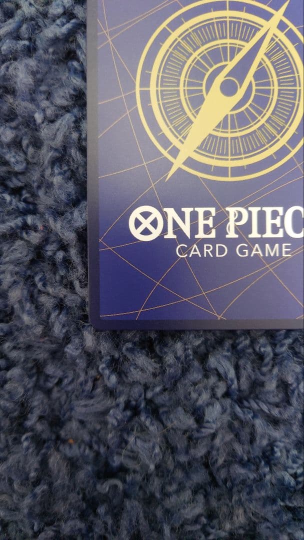 One Piece Portgas D. Ace P-028 card in sleeve with loader and zip lock in cardboard sandwich