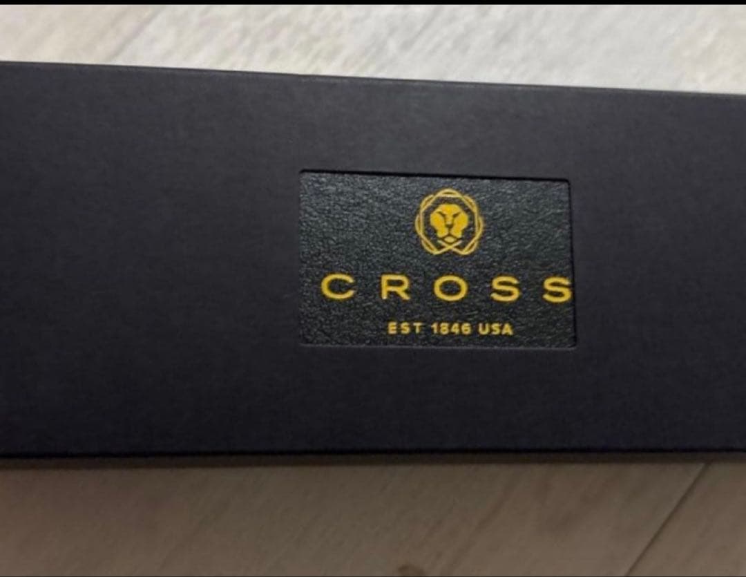 Cross black metal ballpoint pen with dedicated case on white background