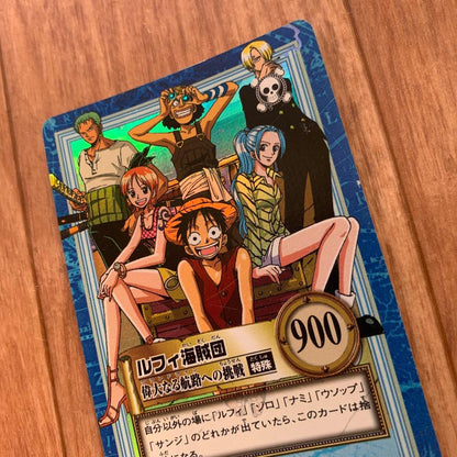 One Piece Prism collectible card pack featuring Luffy, Nami, Zoro, Usopp, Sanji, and Vivi characters