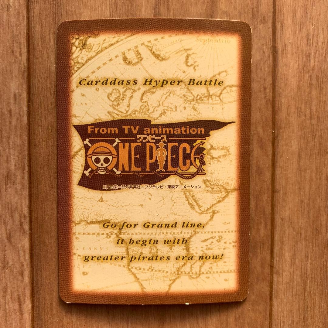 One Piece Prism collectible card pack featuring Luffy, Nami, Zoro, Usopp, Sanji, and Vivi characters
