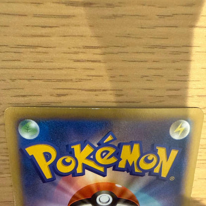 Pokémon Daisuki Club SR Japan Import card showing front with white scratch on upper back side