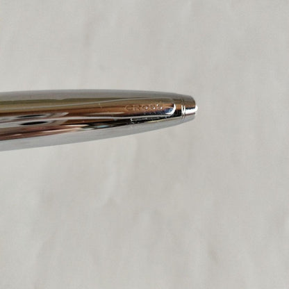 Sigma Cross ballpoint pen Japan import showing black ink with signs of use including small scratches and paint peeling