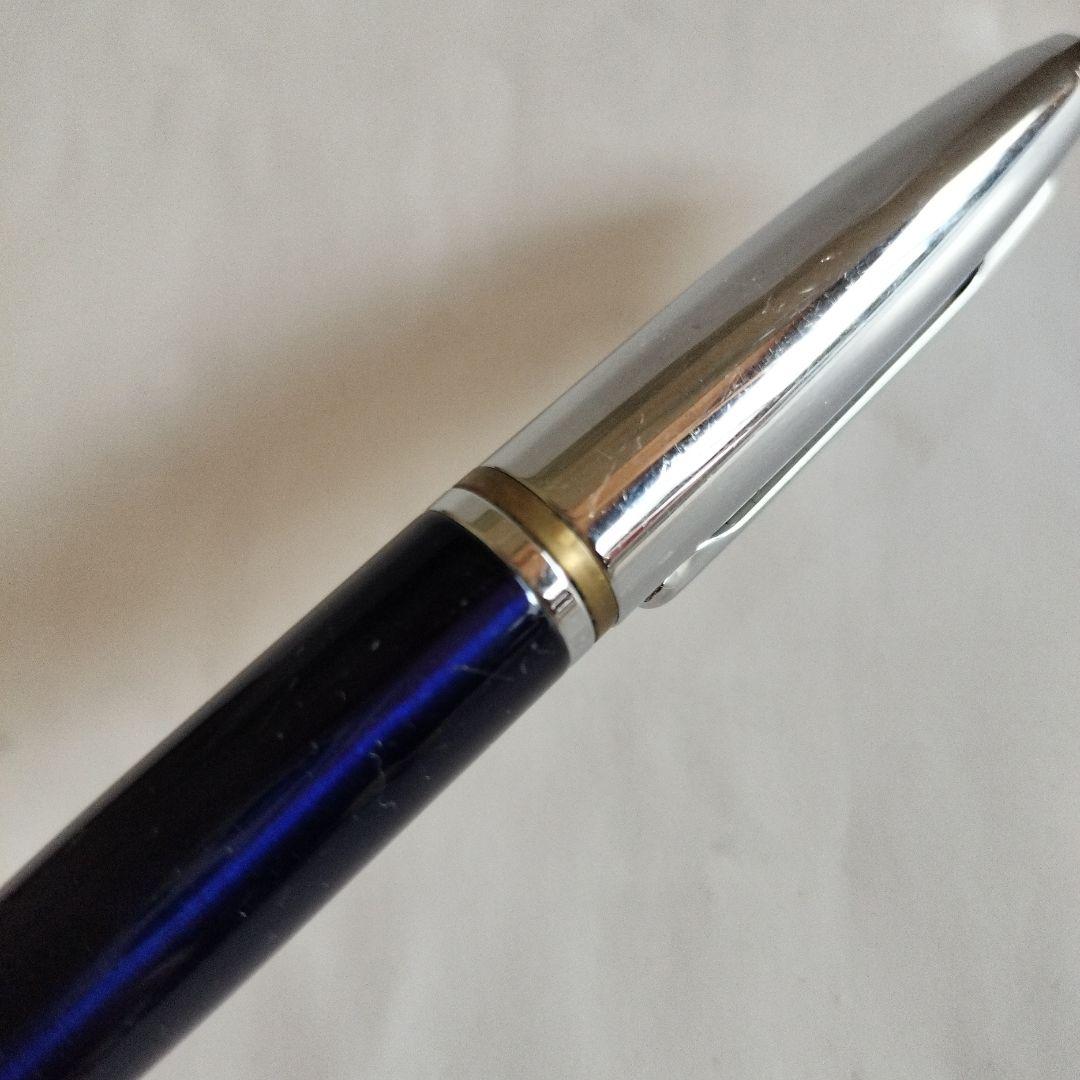 Sigma Cross ballpoint pen Japan import showing black ink with signs of use including small scratches and paint peeling