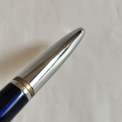 Sigma Cross ballpoint pen Japan import showing black ink with signs of use including small scratches and paint peeling