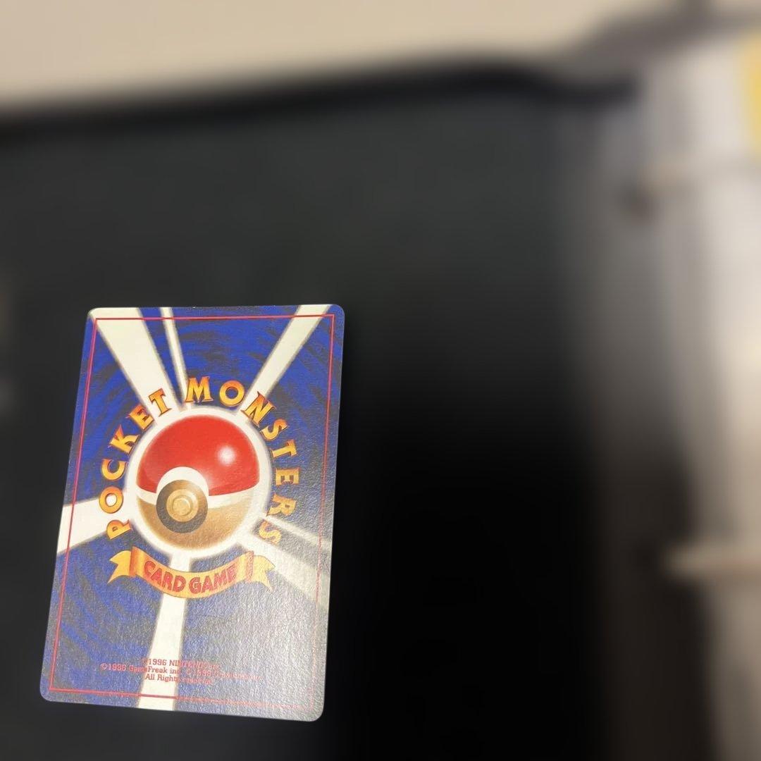 Pokemon Riichu Holo Card from old series Japan import showing angled lighting and good condition