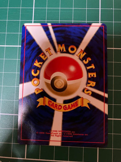 Japanese Nintendo Pokémon card featuring Umbreon level 40 with Cosmos holo mirror finish