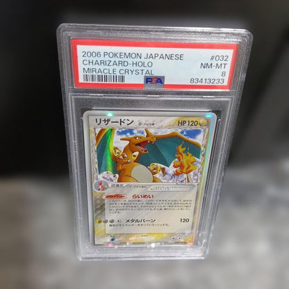 2006 Pokemon Holo Charizard Miracle Crystal #032 collectible card graded NM-MT